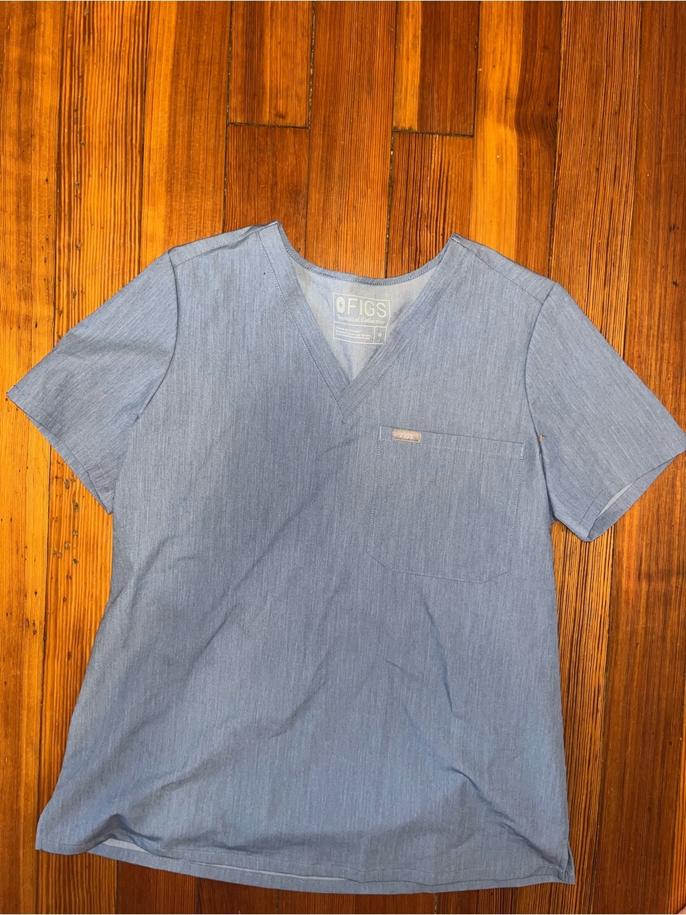 FIGS light blue scrub top medium